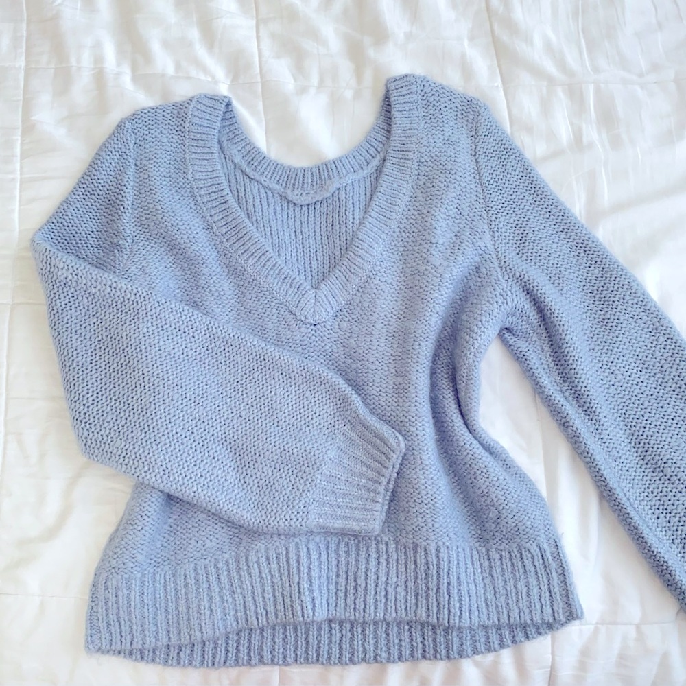 knitted periwinkle light-weight sweater. never worn. estimated size Large.
